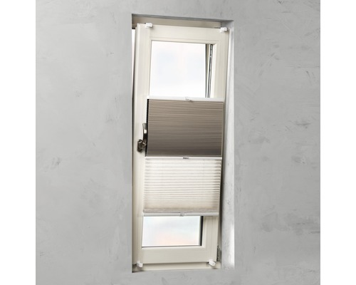 Plisségordijn op raam voor lichtregeling