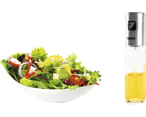 Salade met een spuitfles slasaus