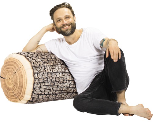 Decoratief kussen boomstam met man op de achtergrond