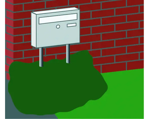 Brievenbus op poten voor een bakstenen muur