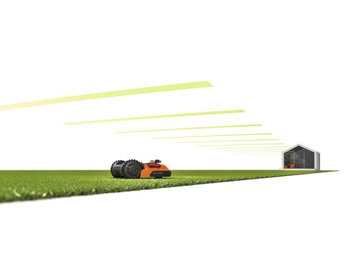 Robotmaaier op gazon voor een huis