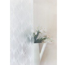 Decoratieve folie met patroon naast vaas met bloemen