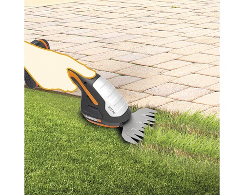 Accugrasschaar in gebruik voor het knippen van gazonranden