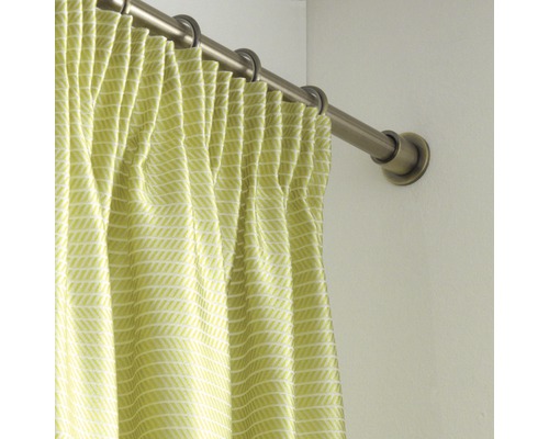 Gordijn met motief aan een gordijnroede