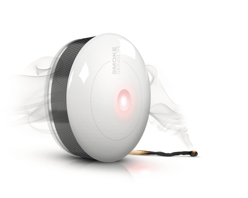 Ronde rookmelder met testknop en rookontwikkeling
