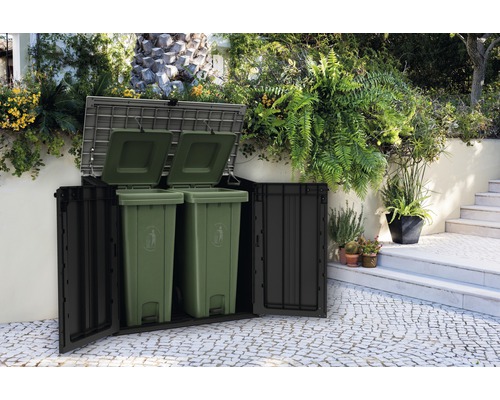 Afvalcontainerbox met twee groene afvalcontainers en open deuren in de tuin