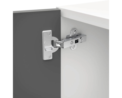 Scharnier bevestigd aan een meubeldeur