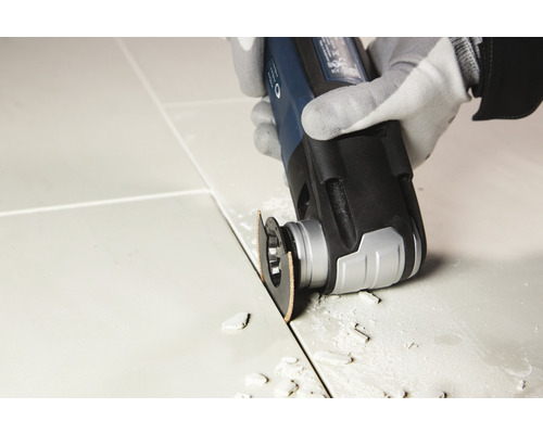 Multifunctioneel gereedschap bij het bewerken van een tegelvoeg