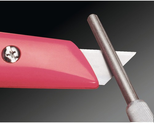 Cutter met metalen handgreep om het mes te slijpen