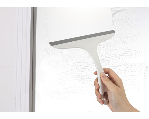 Raamwisser in gebruik op een glazen oppervlak