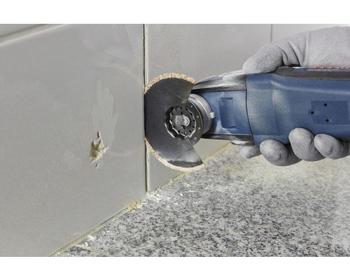 Multifunctioneel gereedschap bij het snijden van tegels