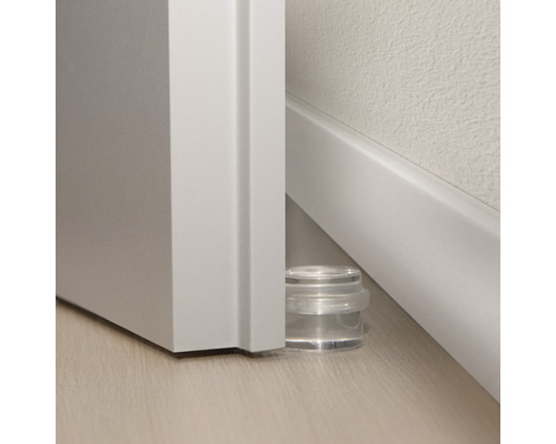 Transparante deurstopper op de vloer voor een deur