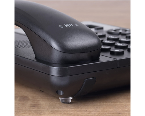 Detailopname van een zwarte bureautelefoon met HD-functie