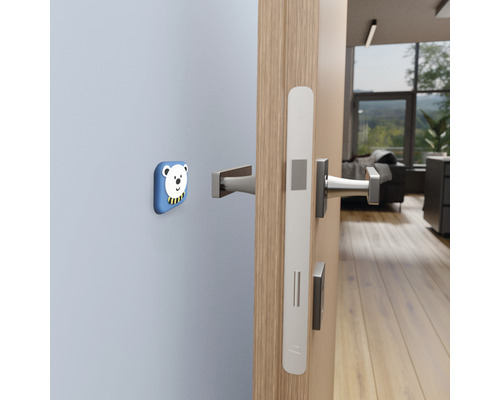 Deur met deurklink en deurstopper met berenmotief