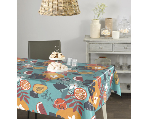 VÉNILINE Tafelzeil Fruity summer blauw 140 cm breed (van de rol) Tafel met wasdoek met fruitmotief in een eetkamer
