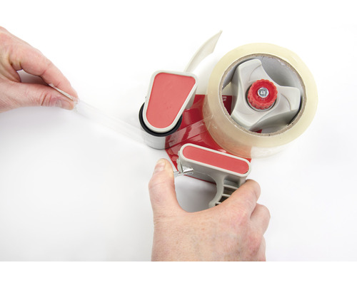 Verpakkingstape dispenser met tape in actie