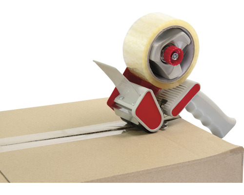 Tape dispenser in gebruik op een kartonnen doos