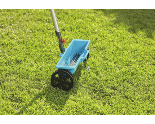 Tuinstrooier op gazon