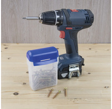 Accuboormachine met schroeven en schroefdoos