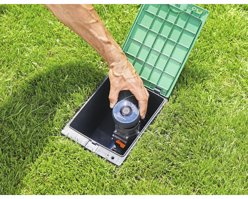 Installatie van een sprinklersysteem in de tuin