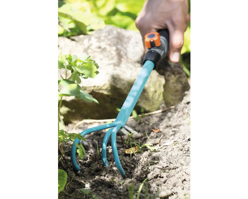 Tuinfrees in gebruik voor grondbewerking