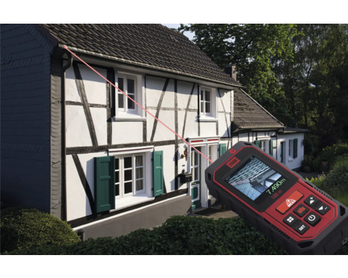 Laserafstandsmeter bij het meten van een huis