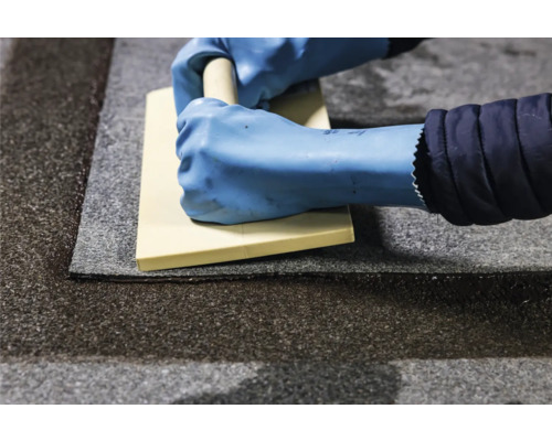 Verwerking van vloeibaar kunststof met een spaan