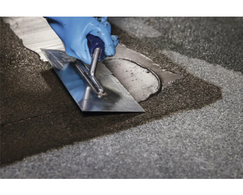 Verwerking van voegmiddel met een voegspaan