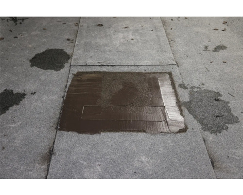 Reparatieplek op een bitumen dak