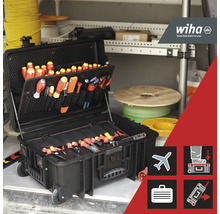 Geopende gereedschapskoffer met diverse gereedschappen en Wiha Logo