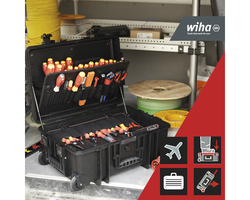 Geopende gereedschapskoffer met diverse gereedschappen en Wiha Logo