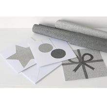 Decoratief cadeaupapier en wenskaarten met ster-, bal- en cadeauontwerp