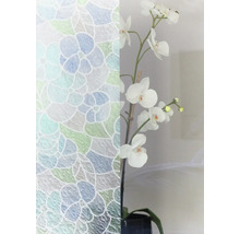 Decoratieve folie met bloemmotief naast een witte orchidee