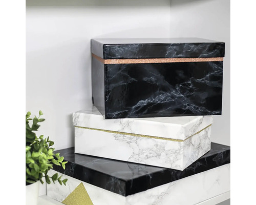 Stapel decoratieve opbergdozen met marmerpatroon