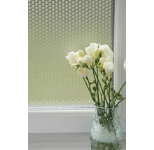 Decoratieve folie op een raam met bloemen in een vaas
