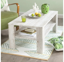 Salontafel met opbergvak en decoraties op een vloerkleed