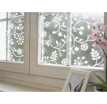 Raam met raamfolie met bloemenpatroon