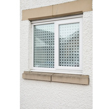 Raam met decoratieve folie voor meer privacy