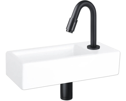 Wastafel met zwarte kraan