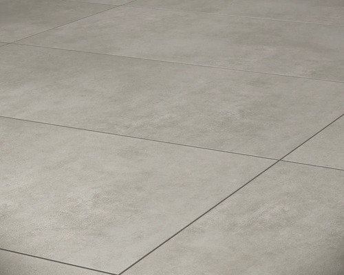 Gelegde vloertegels met voegen