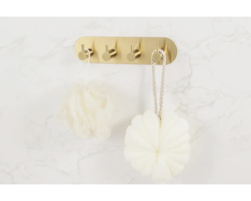Wandgarderobe met vier haken en twee badsponzen
