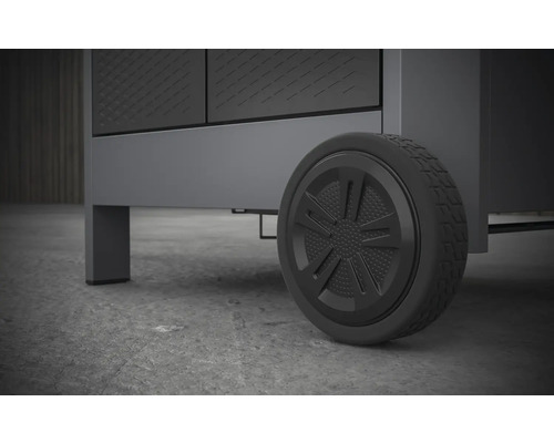 Detailopname van een grijze werkplaatskast met wiel