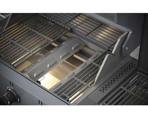 Binnenkant van de grill met grillrooster en afdekking