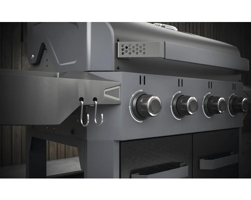 Gasbarbecue met vier branders en zijhaken.