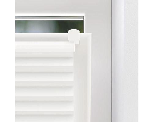 Close-up van een witte jaloezie op een raam