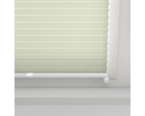 Detailopname van een plisségordijn voor het raam