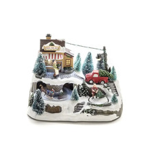 Kerstdecoratie met geanimeerd winterlandschap, bomen en figuren