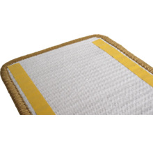 Achterkant van een trapmat met plakstrips