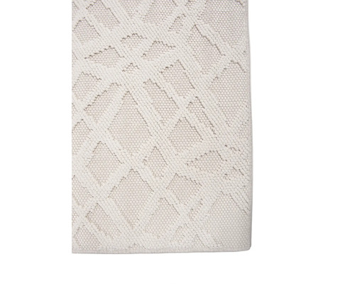 Detailaanzicht van een tapijt met geometrisch patroon