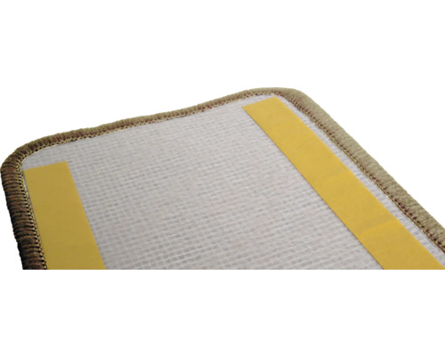 Gedetailleerd zicht op een tapijtonderlegger met plakstrips